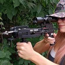 Girl aiming with mini Striker crossbow