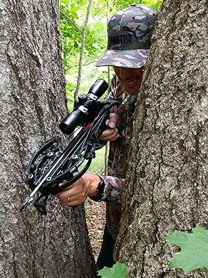 Mini Striker pistol crossbow hunting in tree